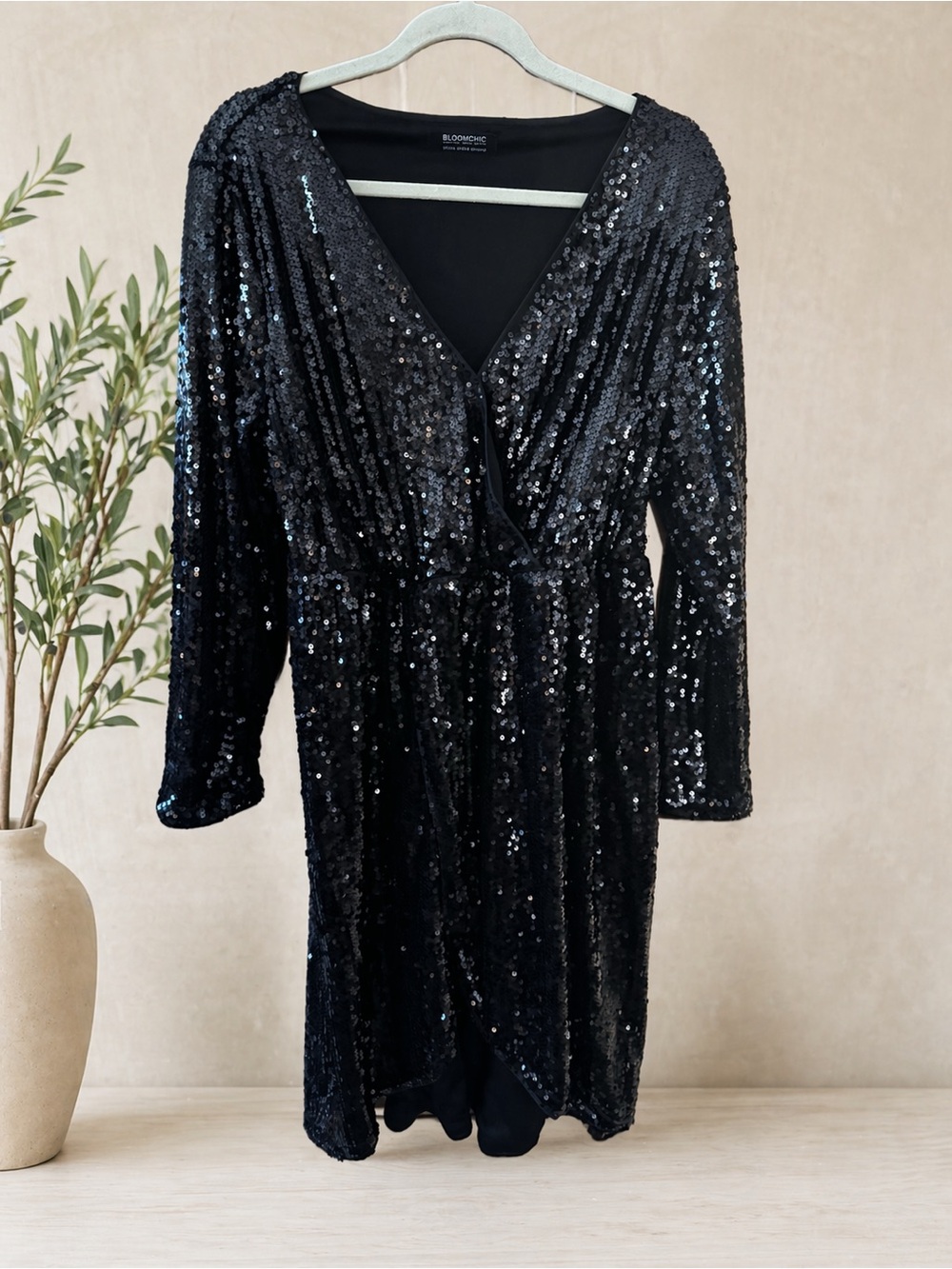 Bloomchic’s Black Sequin Wrap Dress